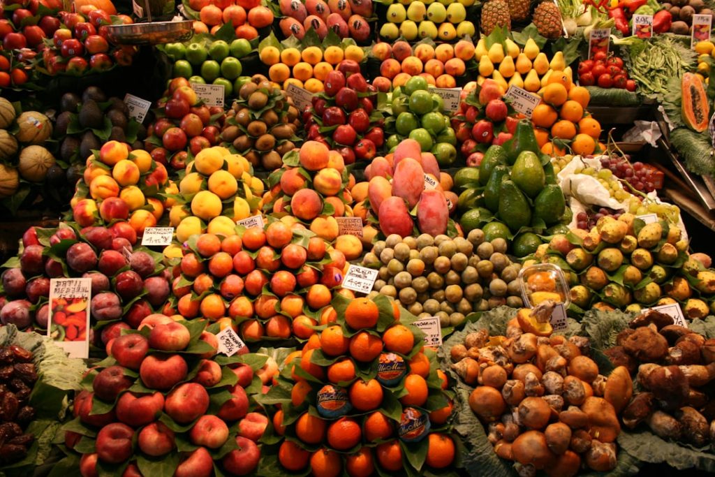 a-large-display-of-fruits-and-vegetables-for-sale-3hzjmmsszbw